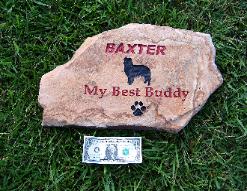 Pet memorial carved in stone.