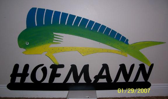 Metal dolphin sign and metal cutouts