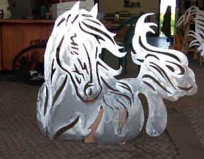 Horse cut from metal at plasma designs.