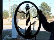 metal lighthouse silhouette by plasma designs