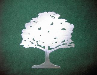 Tree cut from metal, also metal oak tree.