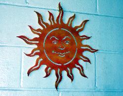 Metal sun image for wall art.